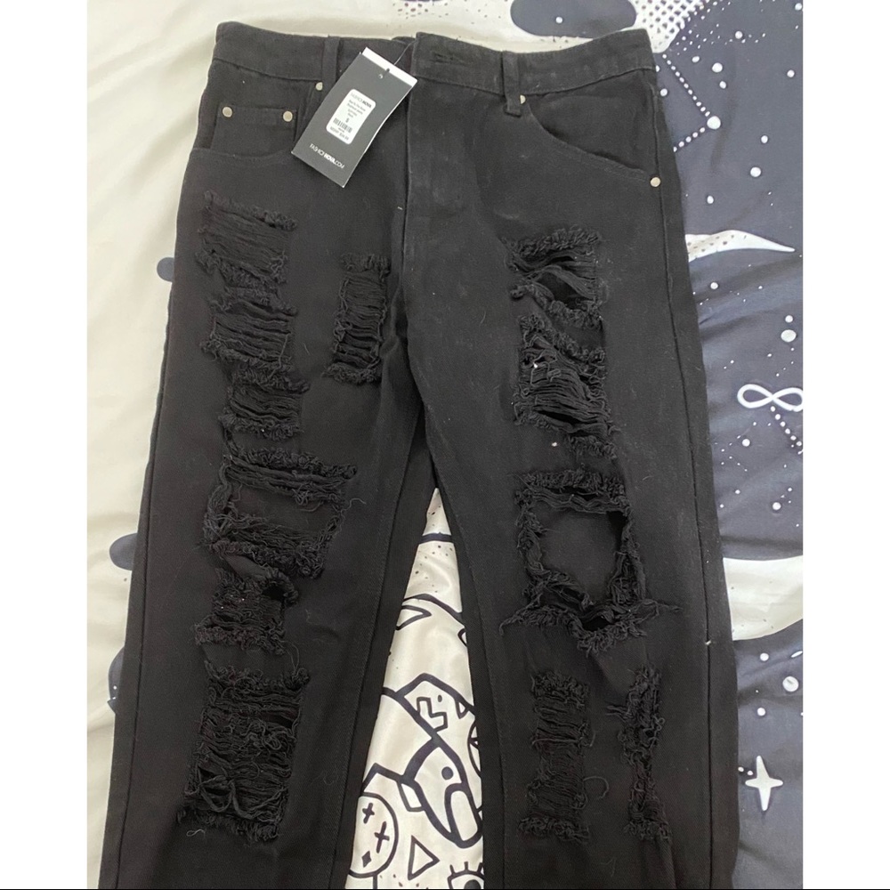 “BAD TO THE BONE BOYFRIEND JEANS”